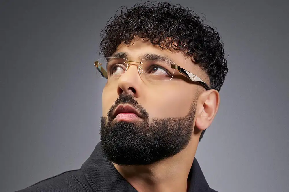 Badshah wearing optical eyewear from the MAYBACH Eyewear limited edition