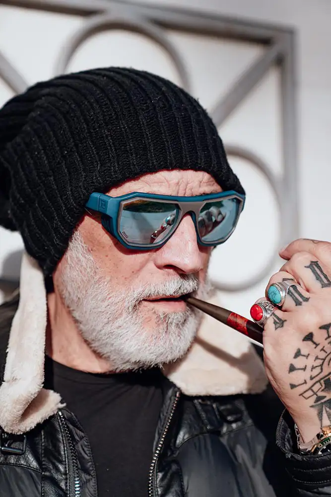 Aldo Farinola wearing the Zirkel Optics Sawtooth in a modern dandy portrait