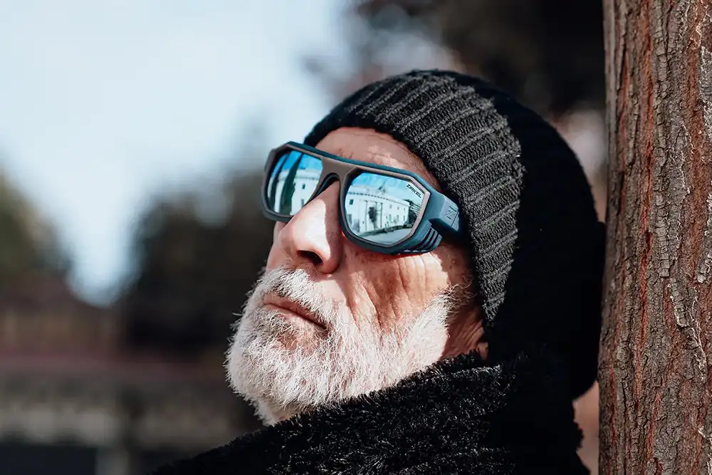 Aldo Farinola wearing the Zirkel Optics Sawtooth in a modern dandy lifestyle portrait
