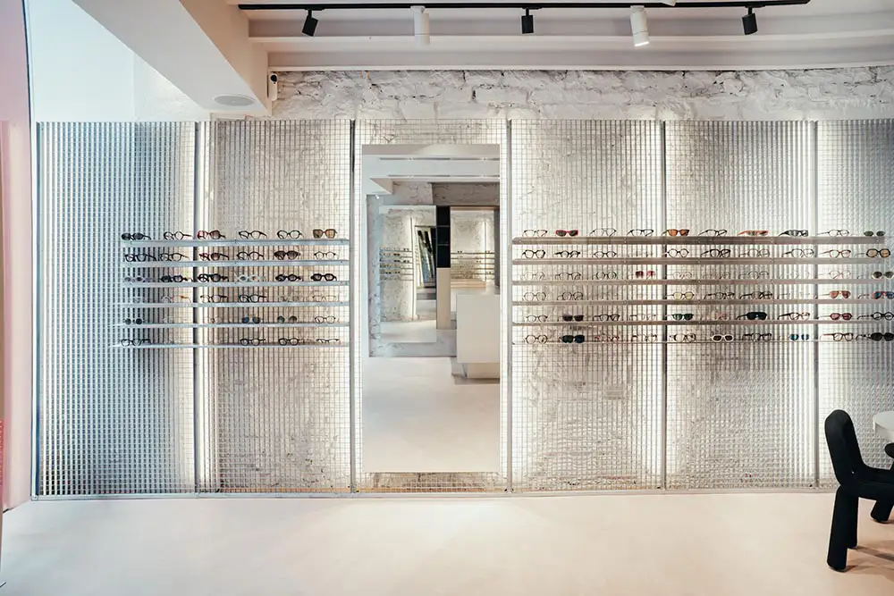 Independent eyewear wall display at LOULOU Opticiens Lyon