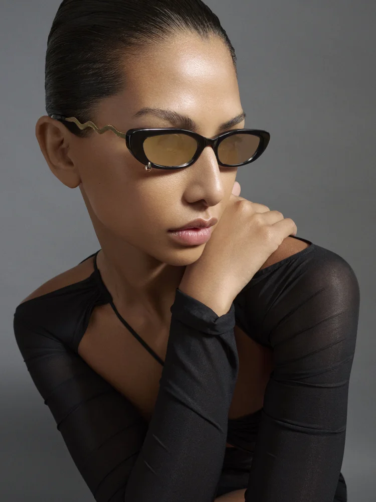 fine jewellery eyewear black cat eye frame with gold temple detailing