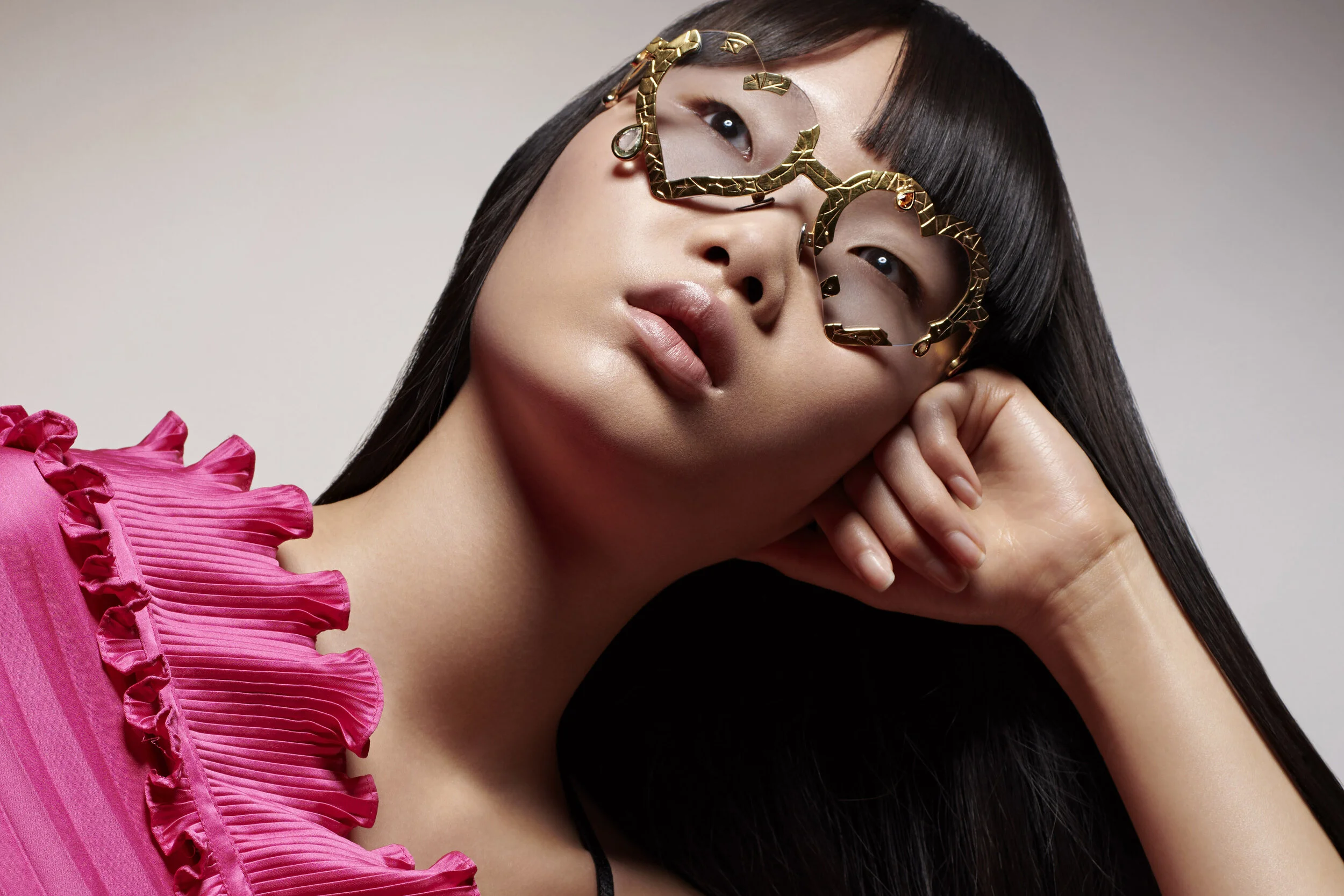 Francis de Lara NOW Awards 2026 gold sculptural eyewear frame in fashion portrait
