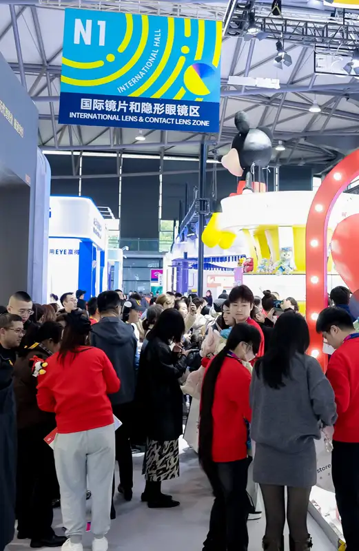 Visitors exploring the international lens zone at Shanghai International Optics Fair 2026
