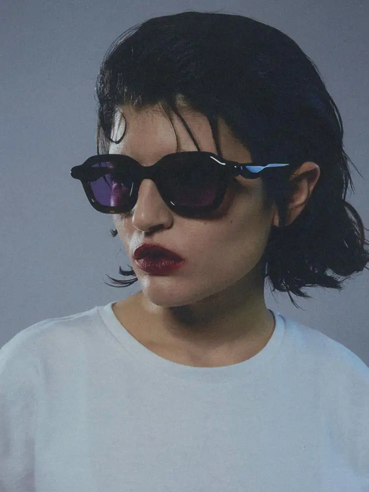 Paloceras sunglasses collection with orange sculptural acetate frame
