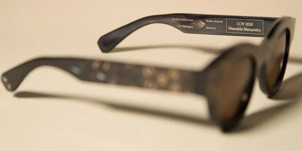 Material detail of Ludovic Elens Handcrafted Eyewear showing buffalo horn, Cuban mahogany, boxwood and mother-of-pearl used in the frame.